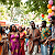 Post: The image captures a lively cultural festival scene among Black men and women, filled with joy and...
